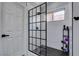 Clean bathroom showing the glass enclosed shower featuring sleek black hardware at 8150 Beaverbrook Way, Las Vegas, NV 89123