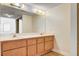 Bathroom showcasing a double sink vanity, and spacious mirrors in a well-lit space at 8233 Willeta Ave, Las Vegas, NV 89145