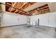 Spacious garage features laundry hookups, high ceilings and white painted walls at 8233 Willeta Ave, Las Vegas, NV 89145