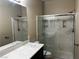 Bathroom featuring a single sink vanity and glass enclosed walk-in shower at 8745 Dodds Canyon St, Las Vegas, NV 89131