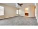 Spacious bedroom with ceiling fan and plush carpeting at 8745 Dodds Canyon St, Las Vegas, NV 89131