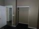 Neutral bedroom with a walk-in closet and an adjacent doorway at 8745 Dodds Canyon St, Las Vegas, NV 89131