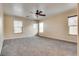 Large bedroom with neutral carpet and ample natural light at 8745 Dodds Canyon St, Las Vegas, NV 89131