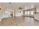 Bright open-concept living room featuring wood-look floors and lots of natural light at 8745 Dodds Canyon St, Las Vegas, NV 89131