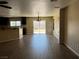 Spacious living room with wood floors and a sliding door leading to the yard at 8745 Dodds Canyon St, Las Vegas, NV 89131