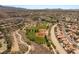 High angle aerial view highlighting a baseball field and surrounding residential area at 900 Cantura Mills Rd, Henderson, NV 89052