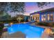 Backyard with a pool, spa, and covered patio at 900 Cantura Mills Rd, Henderson, NV 89052
