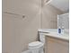 Cozy bathroom featuring a toilet, sink and a shower with glass door at 9017 Cotton Rose Way, Las Vegas, NV 89134