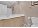 Bathroom featuring a single sink vanity, toilet, framed mirror and neutral wall color at 9017 Cotton Rose Way, Las Vegas, NV 89134
