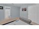 Blue bedroom with carpet flooring, a closet and an access to a bathroom at 9017 Cotton Rose Way, Las Vegas, NV 89134