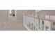 Upstairs hallway showcasing the staircase and nearby bedrooms at 9017 Cotton Rose Way, Las Vegas, NV 89134