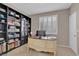 Well-appointed home office with custom built-in shelving and desk, perfect for remote work at 9017 Cotton Rose Way, Las Vegas, NV 89134