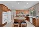 Well-equipped kitchen featuring granite countertops, center island, and stainless steel appliances at 9017 Cotton Rose Way, Las Vegas, NV 89134