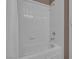 Clean white tiled shower over tub with chrome fixtures and a white shower curtain at 9017 Cotton Rose Way, Las Vegas, NV 89134
