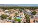 Discover a serene pool home from above, nestled in a lush neighborhood with mountain views and palm trees at 9817 Dardanelle Ct, Las Vegas, NV 89117