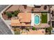 Bird's eye view of property with pool, turf and patio at 9817 Dardanelle Ct, Las Vegas, NV 89117