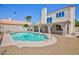 Serene backyard with a pool and covered patio, ideal for summer enjoyment at 9817 Dardanelle Ct, Las Vegas, NV 89117