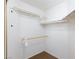 Bright walk-in closet with white shelving and rod for organized storage at 9817 Dardanelle Ct, Las Vegas, NV 89117