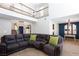 Spacious living room with a view to the loft area and open dining space at 9817 Dardanelle Ct, Las Vegas, NV 89117