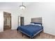 Primary bedroom features high ceilings, plush carpet, and an attached bathroom at 9817 Dardanelle Ct, Las Vegas, NV 89117
