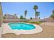 Refreshing pool surrounded by palm trees, offering a private backyard oasis at 9817 Dardanelle Ct, Las Vegas, NV 89117