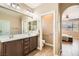 Bathroom with a double sink vanity and lots of room at 10121 Iron Wood Peak Ave, Las Vegas, NV 89166