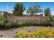 Elegant community entrance sign with lush landscaping at 10121 Iron Wood Peak Ave, Las Vegas, NV 89166