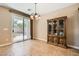 The dining area has access to the outdoor patio and view of the yard at 10121 Iron Wood Peak Ave, Las Vegas, NV 89166