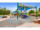 Colorful playground with modern play structures, vibrant colors, and safety-conscious design at 10121 Iron Wood Peak Ave, Las Vegas, NV 89166