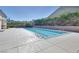Enjoy the community pool, perfect for swimming laps or a refreshing dip, with serene landscaping views at 10357 Bent Willow Ave, Las Vegas, NV 89129