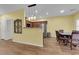 Open concept dining area leading to the kitchen with stainless steel appliances at 10450 Gold Shadow Ave, Las Vegas, NV 89129