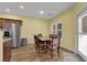 Cozy dining area with stainless steel refrigerator and lots of natural light at 10450 Gold Shadow Ave, Las Vegas, NV 89129