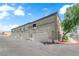 Attractive townhome featuring private garage and well-maintained landscaping at 10450 Gold Shadow Ave, Las Vegas, NV 89129