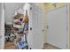 A well-organized storage area in the garage with shelving and ample space at 10450 Gold Shadow Ave, Las Vegas, NV 89129