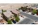 Aerial view of multiple homes in a neighborhood highlighting the layout and landscaping at 10650 Little Horse Creek Ave, Las Vegas, NV 89129