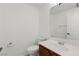 Small bathroom features a clean sink with light wood cabinets and a toilet at 10650 Little Horse Creek Ave, Las Vegas, NV 89129