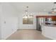 Bright dining area near the kitchen with tile floors and lots of natural light at 10650 Little Horse Creek Ave, Las Vegas, NV 89129