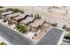 A two-story home is seen with desert landscaping, an attached two-car garage, and a paved driveway at 10650 Little Horse Creek Ave, Las Vegas, NV 89129