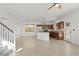 Open-concept kitchen featuring stainless steel appliances and a central island at 10650 Little Horse Creek Ave, Las Vegas, NV 89129