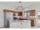 Well-equipped kitchen featuring stainless steel appliances, stone counters, and ample cabinet space at 10650 Little Horse Creek Ave, Las Vegas, NV 89129