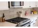 Modern kitchen featuring stainless steel appliances and light countertops at 10712 Aire Dr, Las Vegas, NV 89144