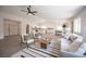 Spacious open-concept living room with modern furniture and lots of natural light at 10712 Aire Dr, Las Vegas, NV 89144