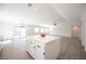 Spacious living room featuring an island, and ample natural light at 10712 Aire Dr, Las Vegas, NV 89144