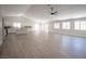 Spacious living room with a kitchen, great for Gathering gatherings and entertaining guests at 10712 Aire Dr, Las Vegas, NV 89144