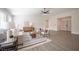 Bright and spacious living area featuring modern furnishings and neutral decor at 10712 Aire Dr, Las Vegas, NV 89144