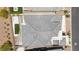 Aerial view of a home with a gray roof, backyard with a pergola, pool, and green turf at 10927 White Clay Dr, Las Vegas, NV 89135