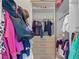 Walk-in closet showcasing an organized hanging rack and built-in shelving at 10927 White Clay Dr, Las Vegas, NV 89135