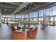 Bright clubhouse lounge area features large windows and stylish modern furniture at 10927 White Clay Dr, Las Vegas, NV 89135