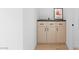 Hallway cabinet offers ample storage space with a modern design and clean lines at 10927 White Clay Dr, Las Vegas, NV 89135