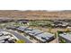 Street view of gray contemporary homes, in a modern planned desert community at 10927 White Clay Dr, Las Vegas, NV 89135